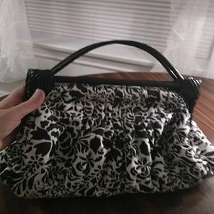 Black and white floral cotton purse.